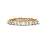 Round brilliant cut moissanite tennis bracelet set in 14k solid gold displaying 26 carat tcw across four prong basket mounts. Articulated link alignment delivers radiant bridal jewelry sparkle for an anniversary gift. Available custom in 10k/14k gold, 925 silver, platinum, stone sizes 1ct to 10ct tcw, and stone variation moissanite or lab grown diamond.