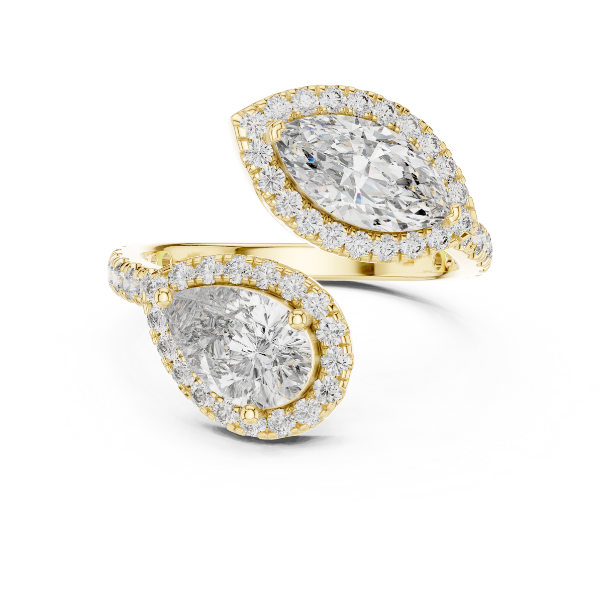 Top-down view of pear and marquise cut lab grown diamond bypass Toi et Moi ring featuring double halos and V-tip prongs on a 14k gold pave band. Ideal modern engagement ring and personalized gift. Made to order in 925 silver, 10k or 14k solid gold, platinum, with custom 1ct to 2ct tw lab diamond or moissanite stones.