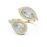 Top-down view of pear and marquise cut lab grown diamond bypass Toi et Moi ring featuring double halos and V-tip prongs on a 14k gold pave band. Ideal modern engagement ring and personalized gift. Made to order in 925 silver, 10k or 14k solid gold, platinum, with custom 1ct to 2ct tw lab diamond or moissanite stones.