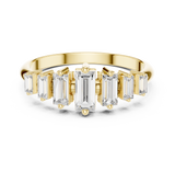 Front view showing seven graduated baguette cut lab diamonds in collet settings on a 14k gold band. Art Deco engagement ring or anniversary band design. Customizable in 925 silver, 10k or 14k solid gold, and platinum with stone sizes from 1ct to 2ct in moissanite or lab grown diamond options.