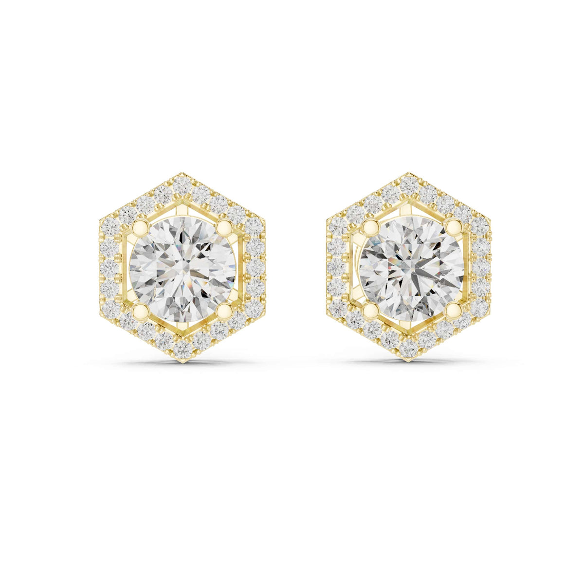 Direct front view displaying 7mm center round gems framed within sharp geometric hexagonal halos. Ideal statement studs or anniversary gifts in 14k gold, 10k gold, 925 silver, or platinum. Customizable stone options from 1ct to 2ct with moissanite or lab grown diamond.