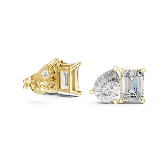 Front view of Toi et Moi stud earrings showcasing side-by-side emerald and pear stones in collet basket prong settings. Features radiant 4.00ctw gems mounted in lustrous 14k gold. Ideal engagement ring companion or bridal gift. Available in 10k/14k solid gold, 925 silver, platinum, from 1ct to 2ct in custom lab grown diamond or moissanite.