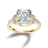 Front view highlighting a radiant cut moissanite center stone secured with double claw prongs and accented by botanical marquise leaf side clusters in 14k gold. A personalized engagement ring available in 10k/14k gold, 925 silver, or platinum with 1ct to 2ct moissanite or lab grown diamond.