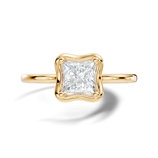 Front view of a geometric princess cut lab grown diamond solitaire ring featuring a scalloped frame setting in 14k white gold. This engagement ring and anniversary gift option is customizable in 10k/14k gold, 925 silver, or platinum with lab grown diamond or moissanite stones from 1ct to 2ct.