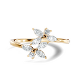 Front view showcasing a botanical marquise leaf cluster bypass ring with lab grown diamonds set in 14k gold. Custom made in 925 silver, 10k gold, or platinum options. Nature inspired promise ring or anniversary gift featuring personalized moissanite and lab diamond stones