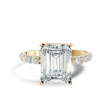 Front view of an emerald cut lab grown diamond solitaire engagement ring in 14k yellow gold with a micro pave band. This classic cathedral ring is customizable in 10k/14k gold, 925 silver, or platinum with lab grown diamond or moissanite center stones from 1ct to 2ct.
