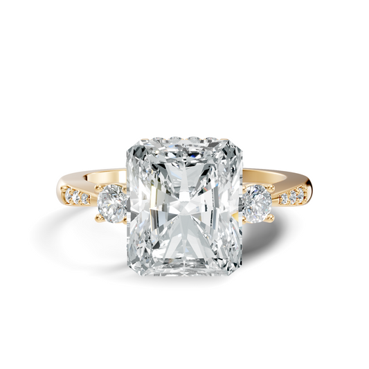 Front view of a radiant cut lab grown diamond engagement ring with three stone side accents in 14k yellow gold. This modern brilliant ring is customizable in 10k/14k gold, 925 silver, or platinum with lab grown diamond or moissanite center stones from 1ct to 2ct equivalent.