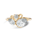 Front view of a twin swan bypass lab grown diamond ring with pear cut stones in 14k yellow gold. This romantic nature inspired ring is customizable in 10k/14k gold, 925 silver, or platinum with lab grown diamond or moissanite center stones from 1ct to 2ct equivalent.