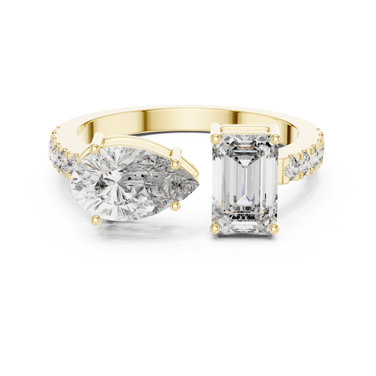 Front direct view of East-West pear and emerald cut lab grown diamond Toi et Moi ring secured by prongs on a 14k gold U-cut pave band. Ideal modern engagement ring and personalized gift. Made to order in 925 silver, 10k or 14k solid gold, platinum, with custom 1ct to 2ct tw pear and emerald lab diamond or moissanite center stones.