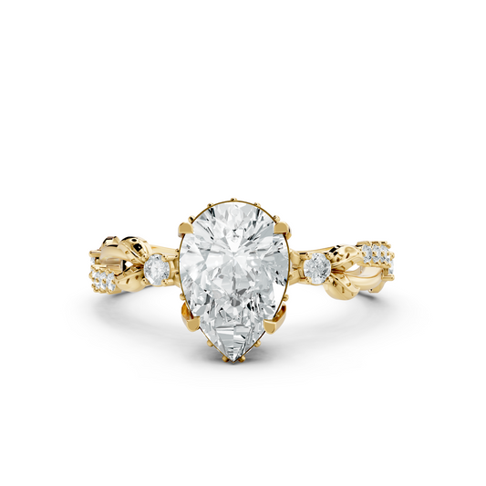 Front view of a nature inspired pear cut lab grown diamond engagement ring with a leaf and vine band in 14k yellow gold. This botanical ring is customizable in 10k/14k gold, 925 silver, or platinum with lab grown diamond or moissanite center stones from 1ct to 2ct equivalent.